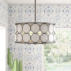 White ceiling light chandelier hanging from bright room