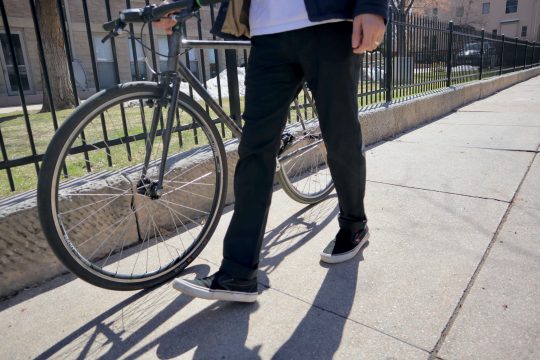 Man walking wearing Western Rise Evolution pants 