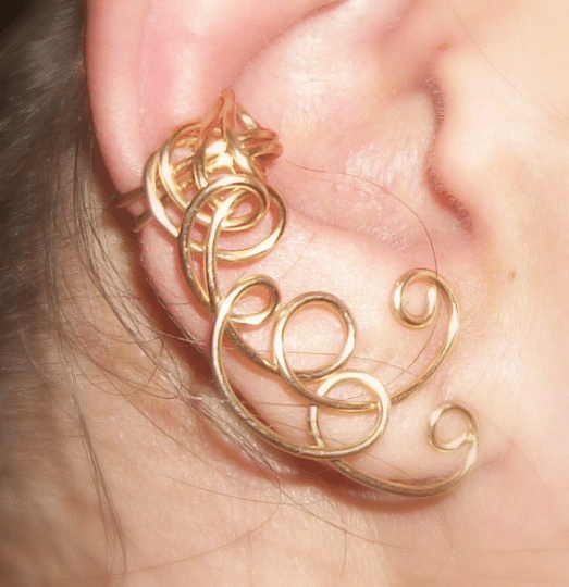 Swirly gold metal ear cuff